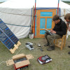Graduate students Patrick Lawrence (Montana State University) and Tom James (Yale) enter their daily data, assisted by solar power